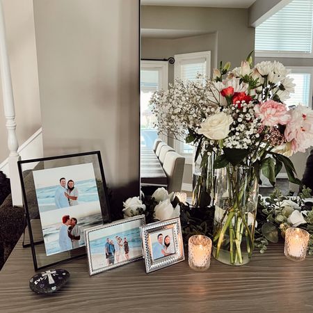 moments from our engagement party! 
• tall class cylinder vases - pack of 12 from amazon
• small glass votives with candles - pack of 24 votives and pack of 100 candles (amazon)
• black metal glass frame (amazon)
Trader joes florals 

#LTKSeasonal #LTKhome #LTKwedding
