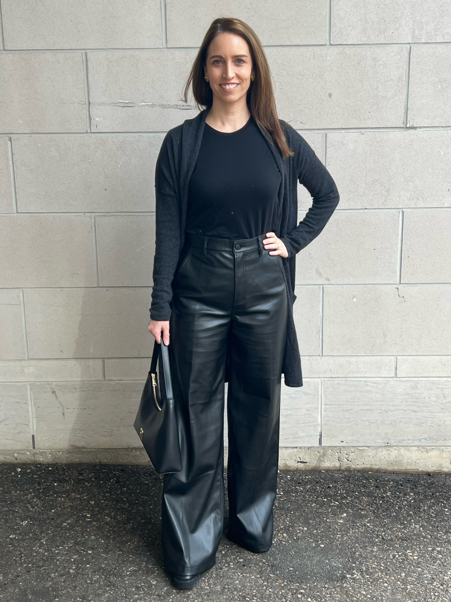 These vegan leather pants are in a current cut - the high waist and the flare are super flattering!  These are very comfortable and I will be wearing them on repeat for casual outings, work wear and nights out.  I’m wearing size 28 in the pants and M in the t-shirt.

#LTKcanada #LTKwinter #LTKworkwear