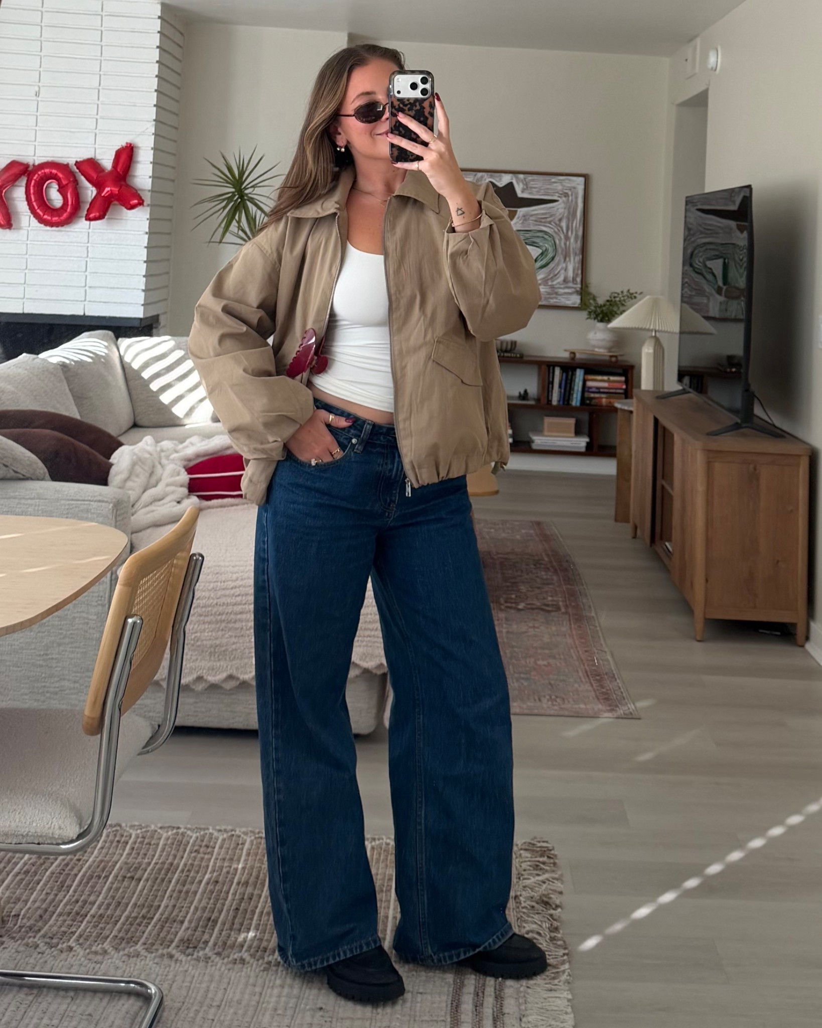 Size M jacket 
Size 6 jeans (I’m 5’5”)