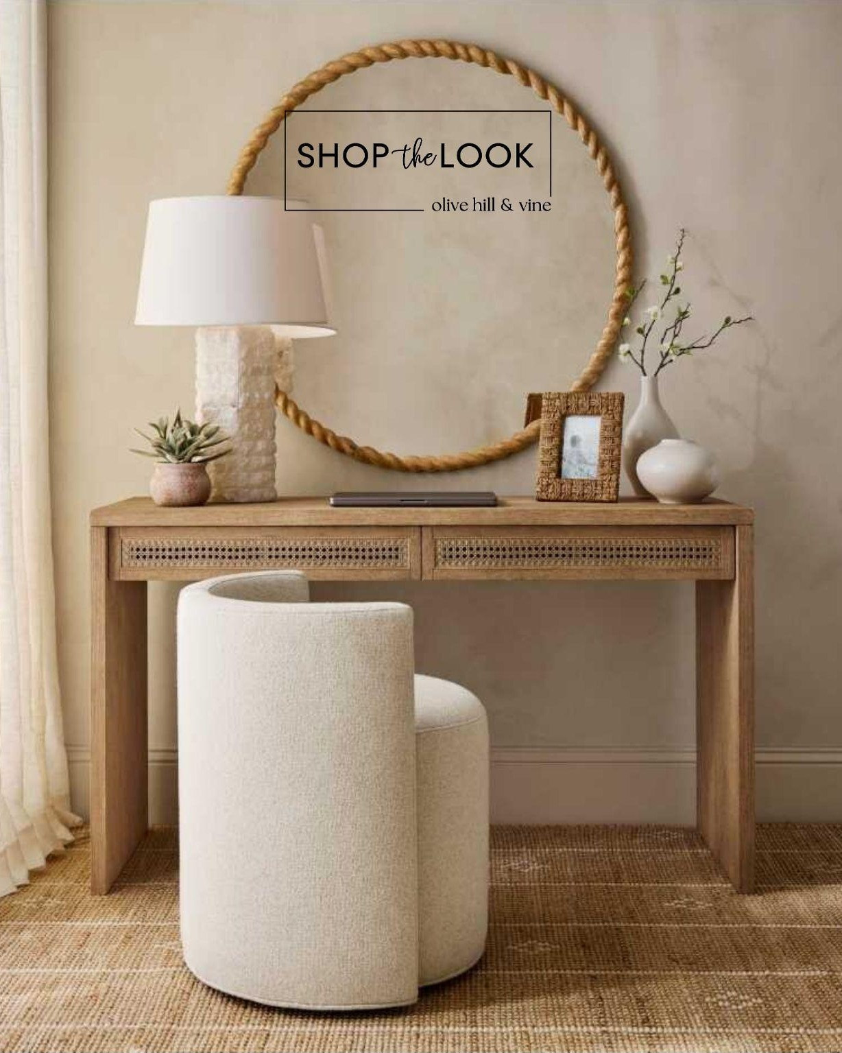 Warm wood tones, woven textures, and soft ivory upholstery come together in a refined workspace that feels both inviting and elevated. Whether styled as a vanity or a hallway desk, this design brings effortless sophistication to everyday living.

#LTKHome