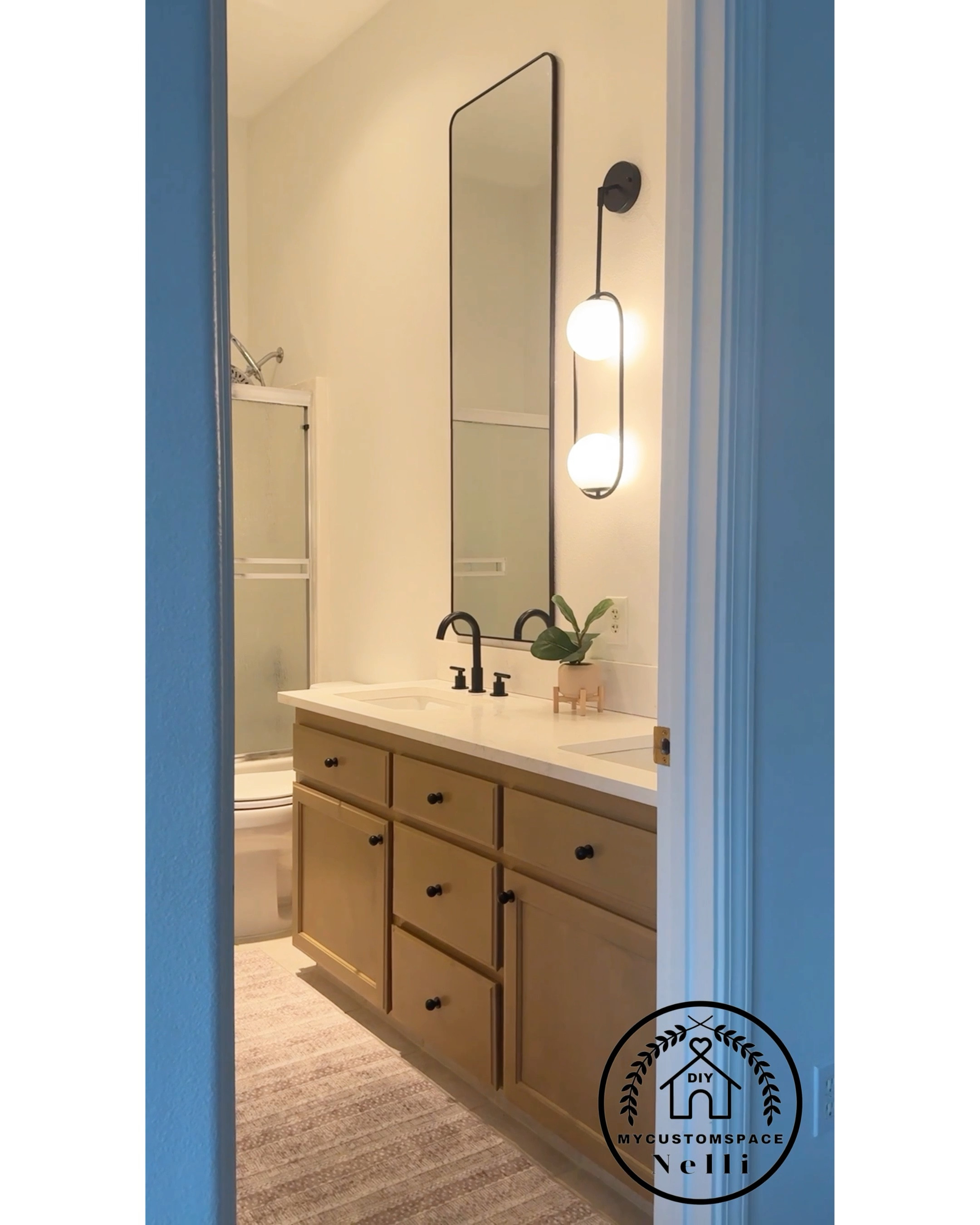 Budget bathroom makeover ✨
Let me give you an honest review about all the items:
1. Light : 💯 love it, but it’s not a scones. You have to modify it to make it one. 10/10
2. Mirrors: great price but quality 5/10. I’m really picky and on 1 mirror the corners are not 100% straight. But I was too lazy to return them. I would 💯 recommend the other mirrors that I got for the primary suit. 
3. Hardware: 10/10
4. Runner: from Costco. It’s washable and soooo soft 11/10
5. Faux plat: very realistic 10/10

#LTKStyleTip #LTKHome #LTKVideo