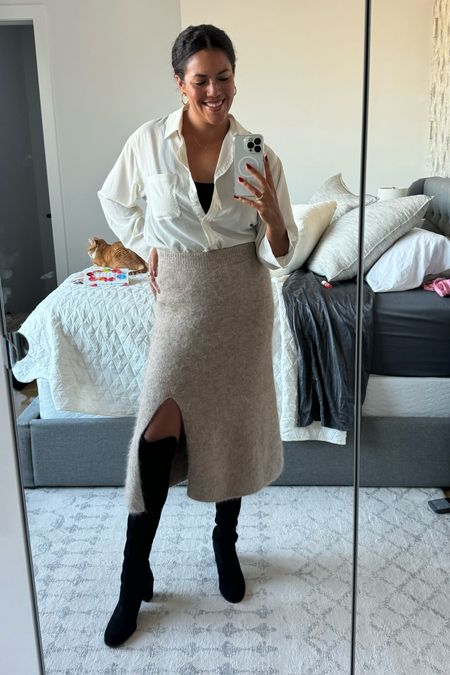 Love a cozy sweater skirt for winter, paired with knee high boots and an oversized silk button down. 

Skirt is Rails (rented from RTR) size large. Shirt is old Aqua but I’ve linked similar. Boots are Stuart Weitzman (from their outlet!) size 11. Gold hoop earrings are Madewell. Tank is a Mangopop bodysuit from Amazon, size large  

Use code RTRALIJ for 30% off your first month of rent the runway. 

#LTKworkwear #LTKSeasonal #LTKstyletip