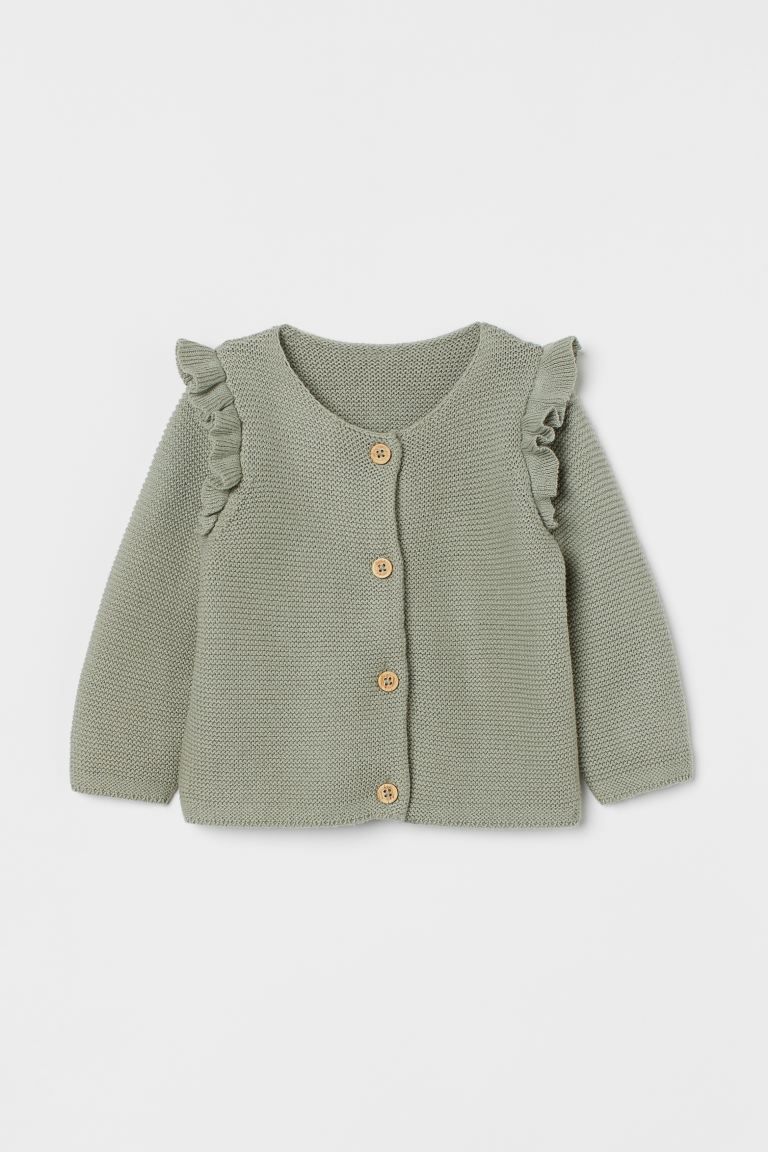 Garter-stitched cardigan in soft cotton. Round neckline, flounced trim over shoulders, and button... | H&M (US + CA)