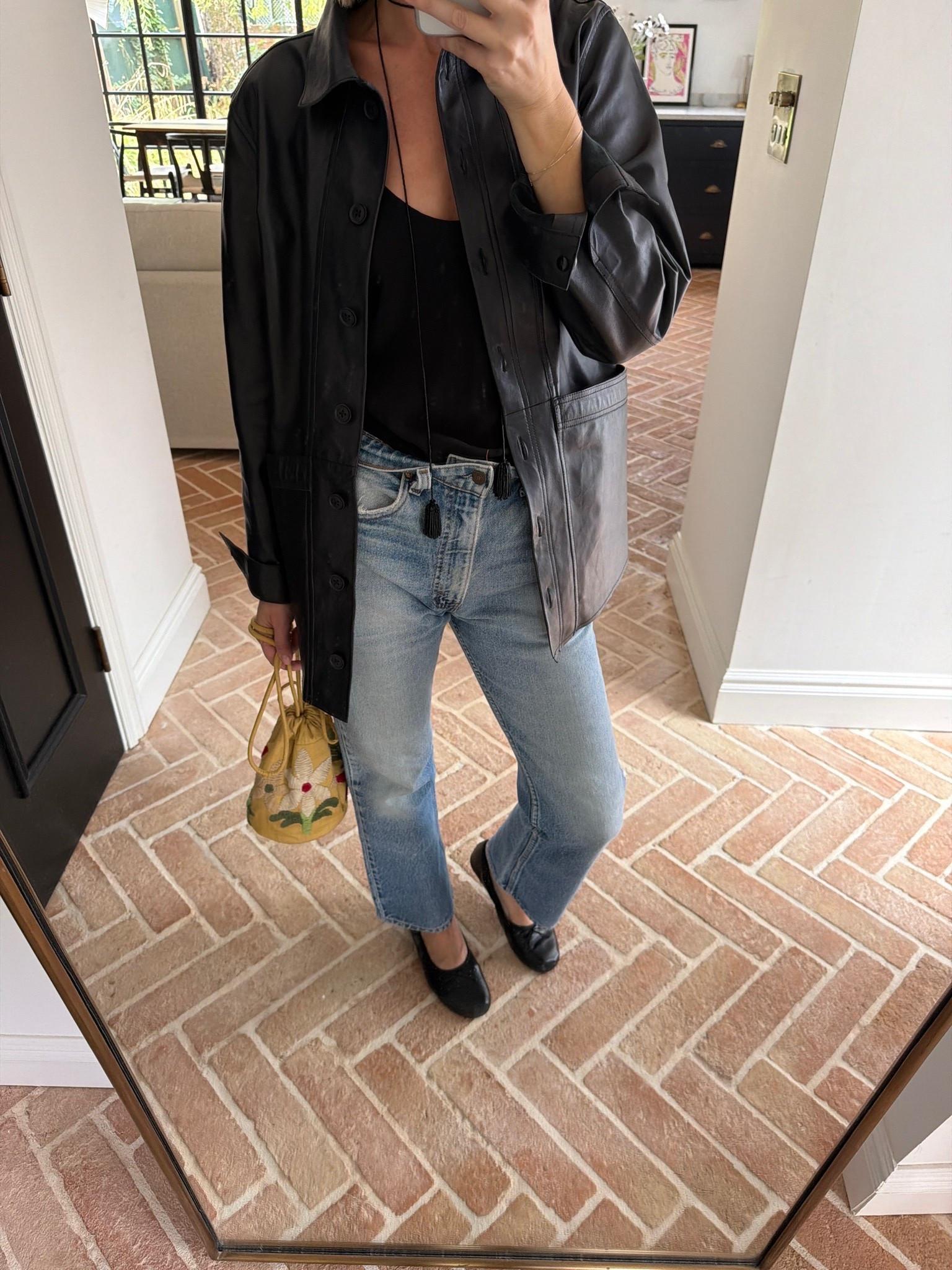 black leather shirt jacket, black leather shacket, black cami top, straight leg jeans, vintage wash denim, embroidered drawstring pouch bag, floral bucket bag, black ballet flats, black pendant necklace, layered necklaces, transitional dressing, autumn outfit, quiet luxury, elevated basics, effortless chic, ltkstyletip, ltkseasonal, ltkfindsunder100, outfit inspo, capsule wardrobe essentials

#LTKFashionMonth #LTKeurope #LTKjeans