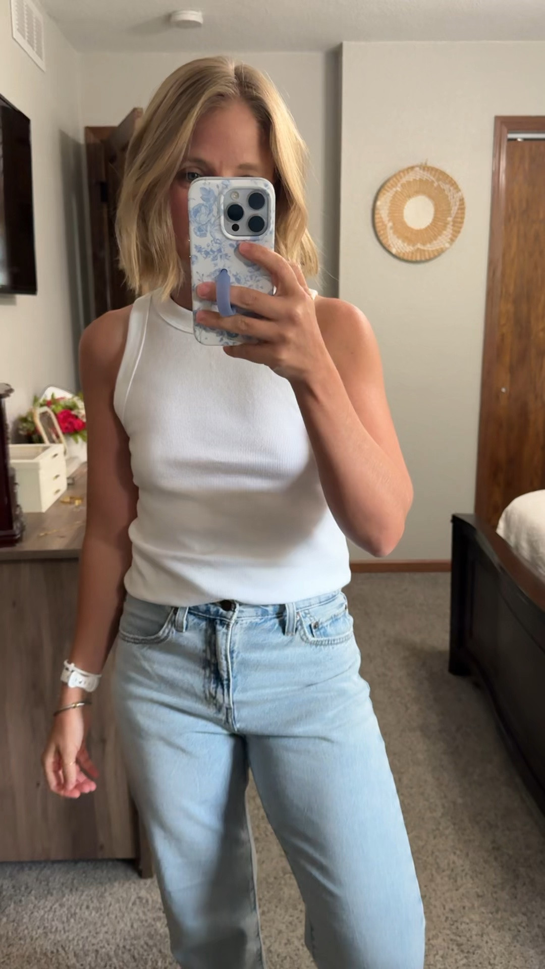 Wearing a medium in the tank, and size 25 in the jeans.

#LTKootd