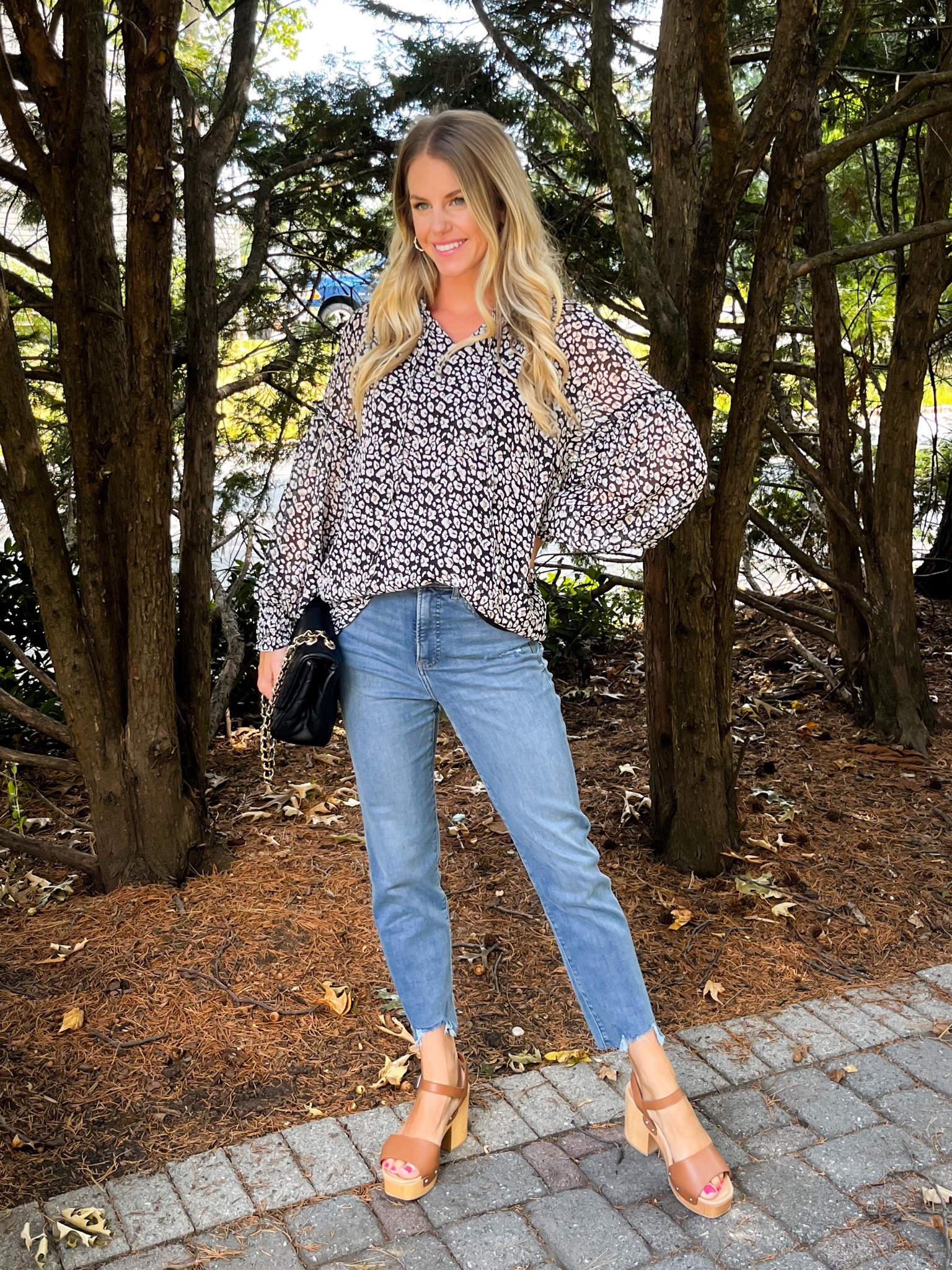 The cutest top! Love the subtle leopard print, the ruffle detail and the sleeve and the smocked wrist! Perfect fall top. Runs TTS. Wearing size small

#LTKworkwear #LTKunder50 #LTKSeasonal