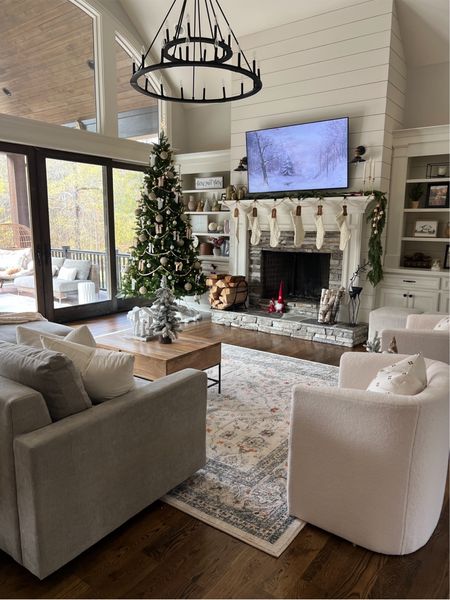 Morgan rug in white from my rug collection 

Our sleeper sectional sofa with storage ottoman 

White sherpa side chairs, neutral living room decor. Cozy living room style 

#LTKSeasonal #LTKHoliday #LTKhome