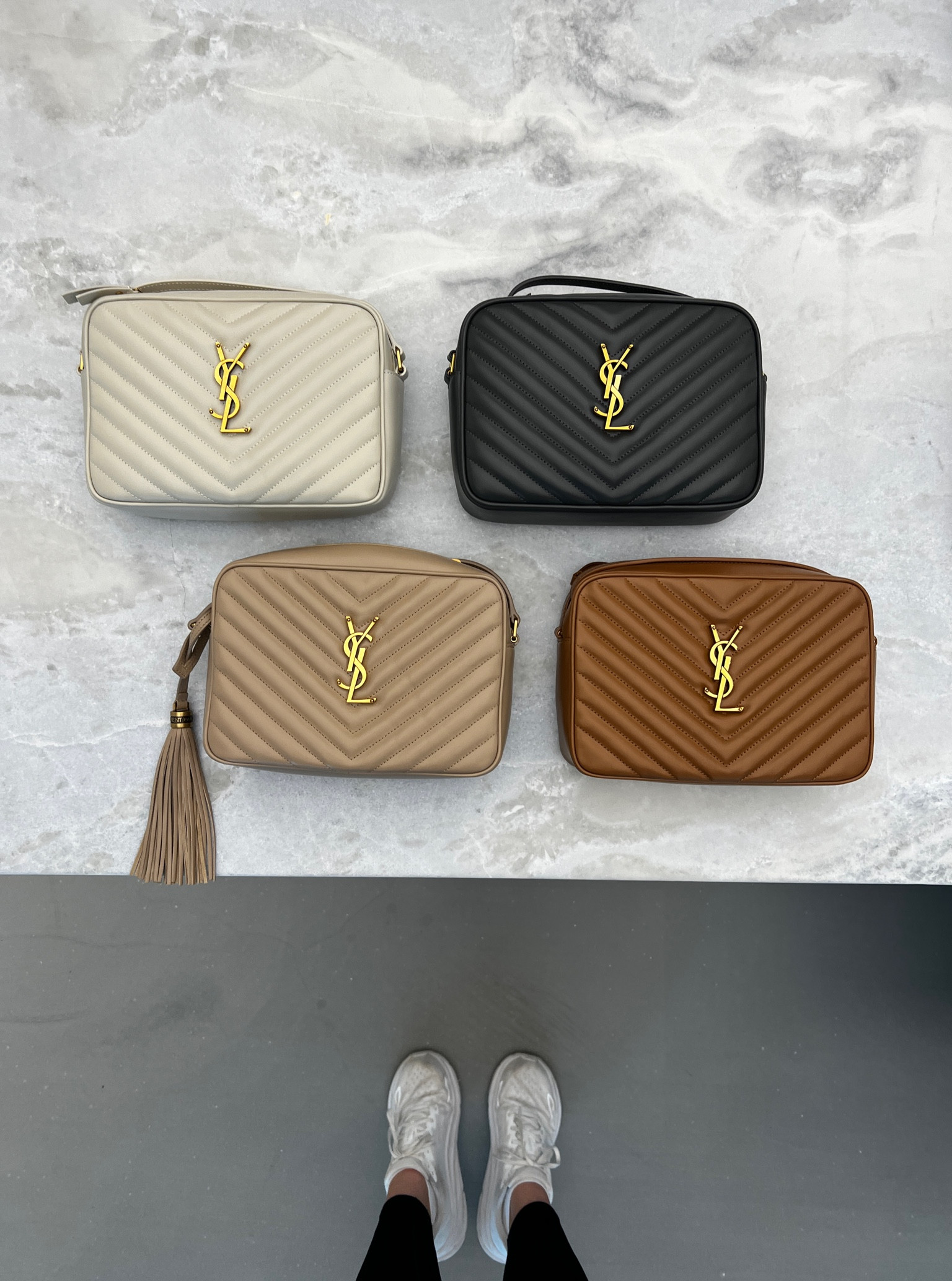 The most gorgeous girl gang. 🤍🖤🤎🩶
Neutral designer handbags don’t get more goals. I have the black one and am eyeing the dark beige in the bottom left. 

It’s truly the BEST designer bag for moms. Mine holds (on a daily basis) two pacifier cases, my wallet, three lip products, tissues, a nail file, my sunglasses and phone. And there’s still plenty more room for more! The back pocket is PERFECT for easy phone access on the go and fits my iPhone 13 Pro Max. Truly mom tested and mom approved! 👏🏻👏🏻

#LTKItBag #LTKFamily #LTKParties