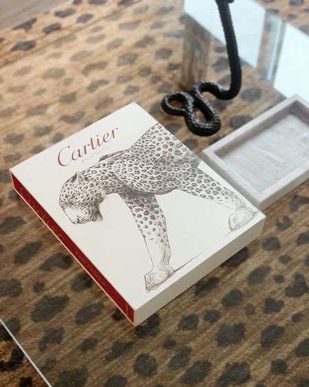 Sooo excited to have gotten my hands on the Cartier panthere book! Stunning visuals, inspo, and it looks gorgeous sitting out 

Cartier panthere, Bloomingdales, investment piece, coffee table book, coffee table decor , casaluna marble tray, target decor

#LTKFind #LTKhome