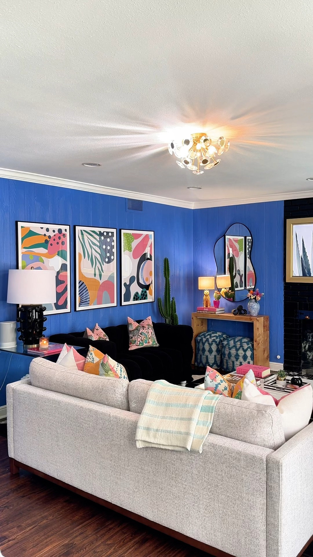 Paint color: Benjamin Moore Watertown
Happy girly colorful living room! 

#LTKHome #LTKVideo #LTKStyleTip