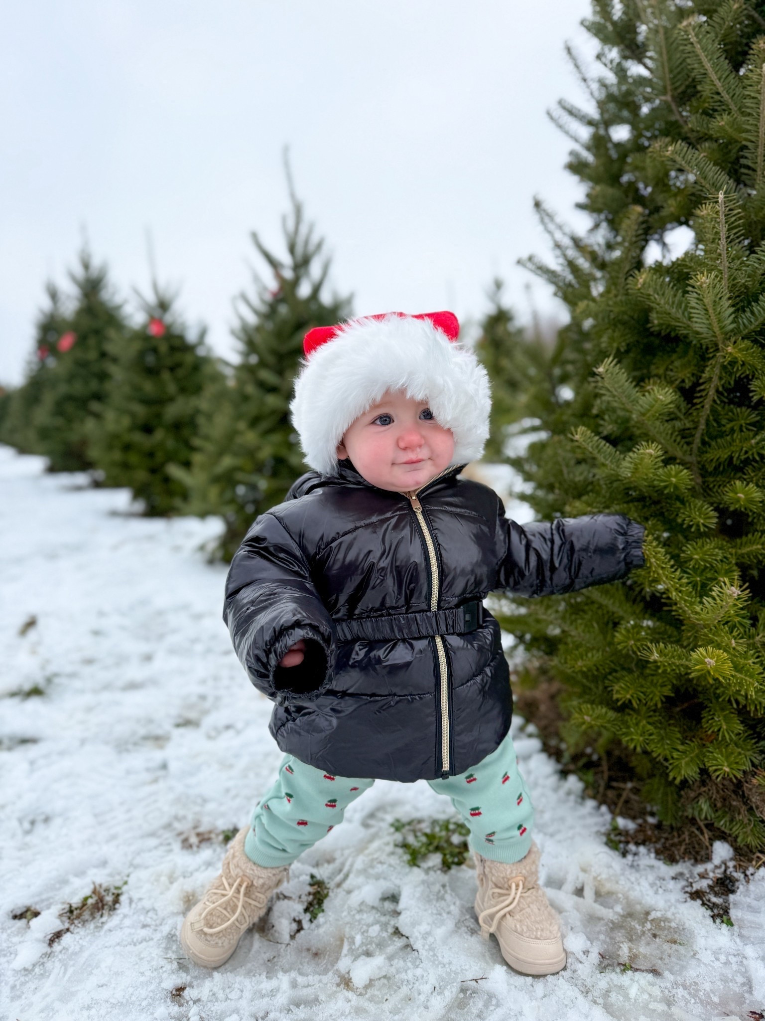 Christmas tree farm shopping with my baby one year old! Such a fun family tradition 🌲

This coat & boots are on sale right now! She’s wearing size 5.5 in the boots and coat is 12 months (I’d say it runs a little big) 

#LTKHoliday #LTKKids #LTKBaby