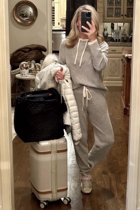 One of my favorite travel day outfits!

Cashmere hoodie and cashmere jogger pants from 
Summersalt
Sherpa Golden Goose 
Paravel aviator plus carry on 
MZ Wallace Metro tote with a cool new insert I just found!
Bogner white ski coat 

#LTKSeasonal #LTKtravel #LTKover40
