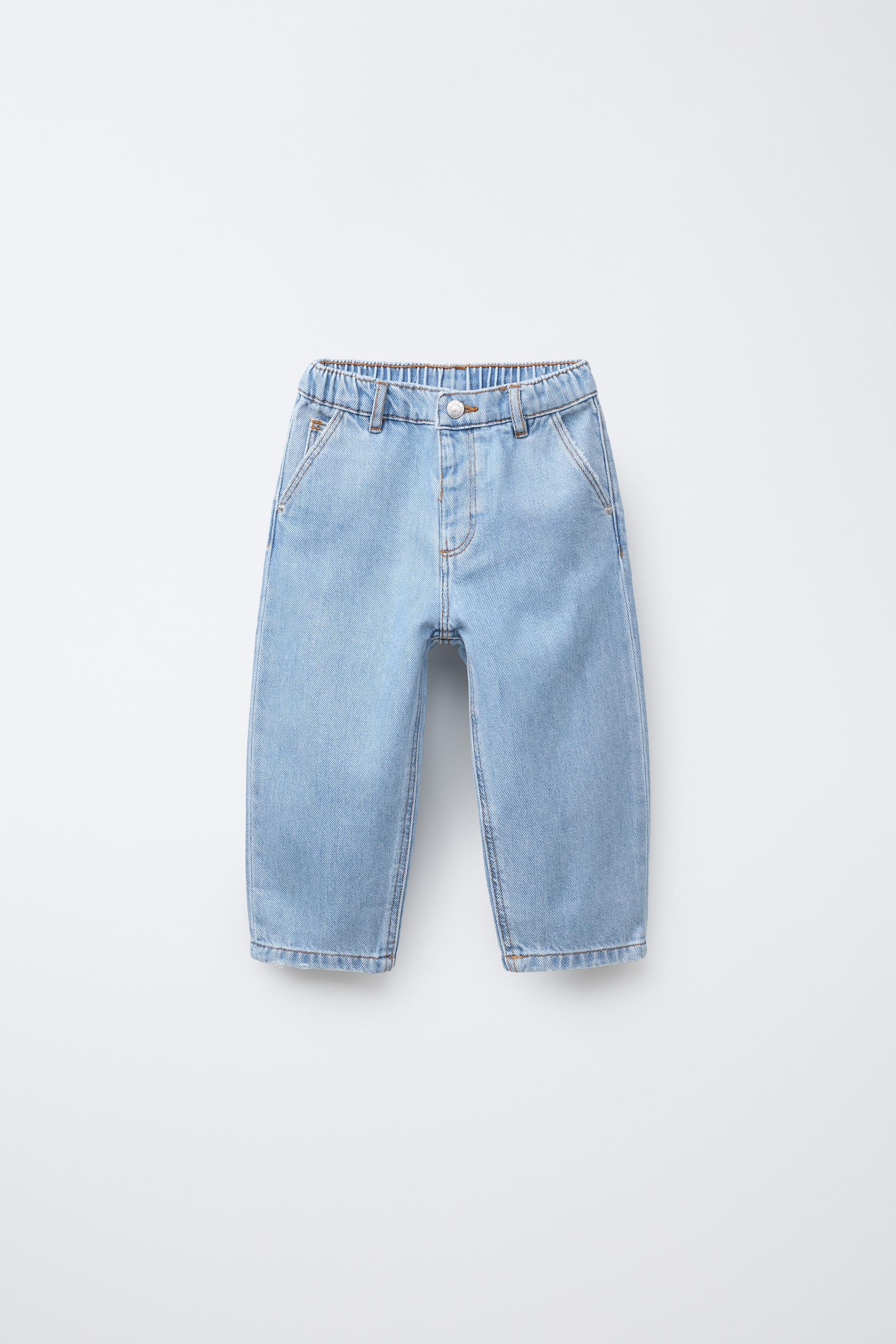 Jeans with adjustable inner waistband and front snap button closure. Front pockets and patch pock... | Zara US