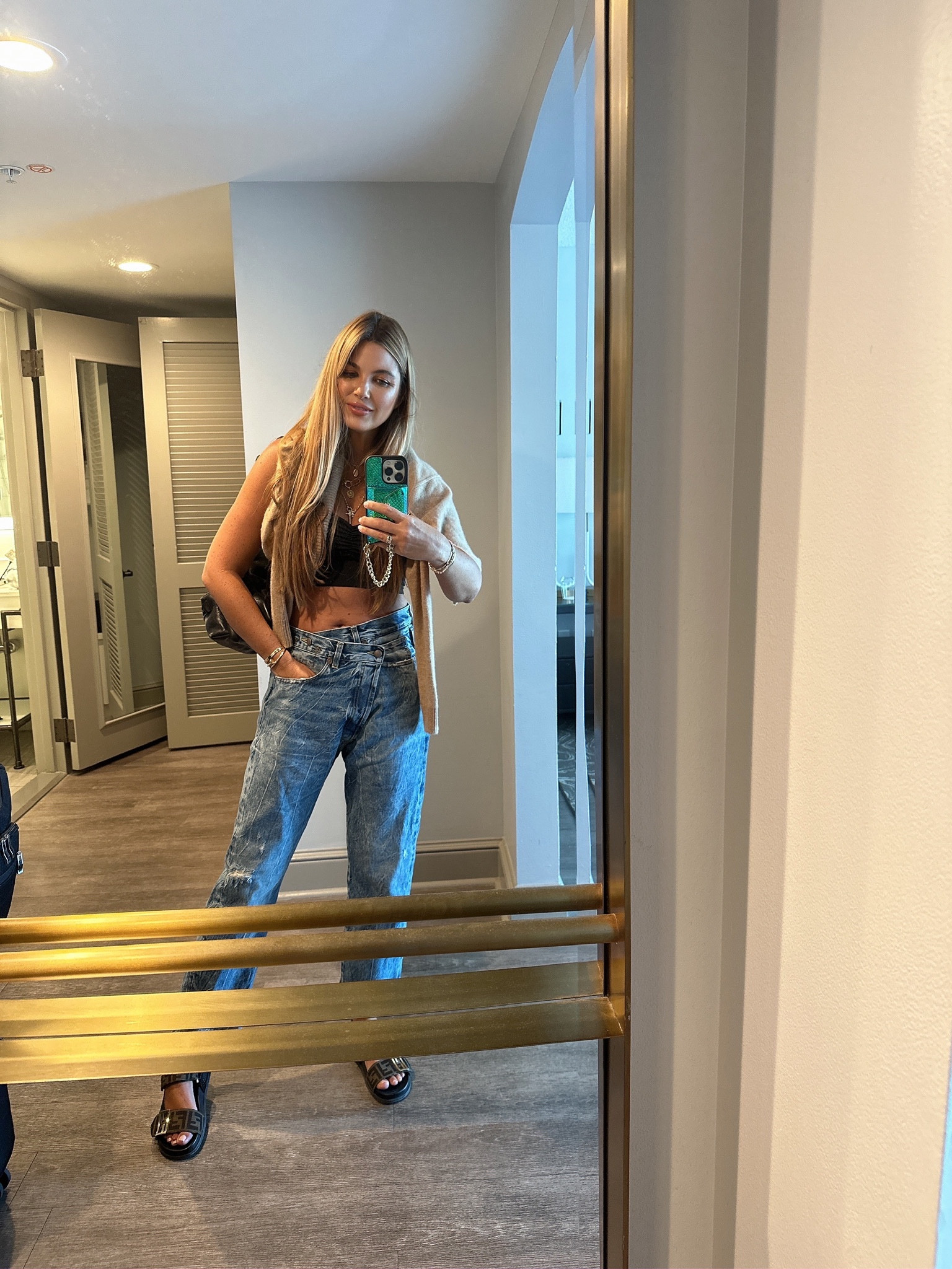 Perpetual travel outfit ✈️
Tank: medium &
 on sale!! 
Jeans: 26
Sweater: medium

#LTKSeasonal #LTKstyletip