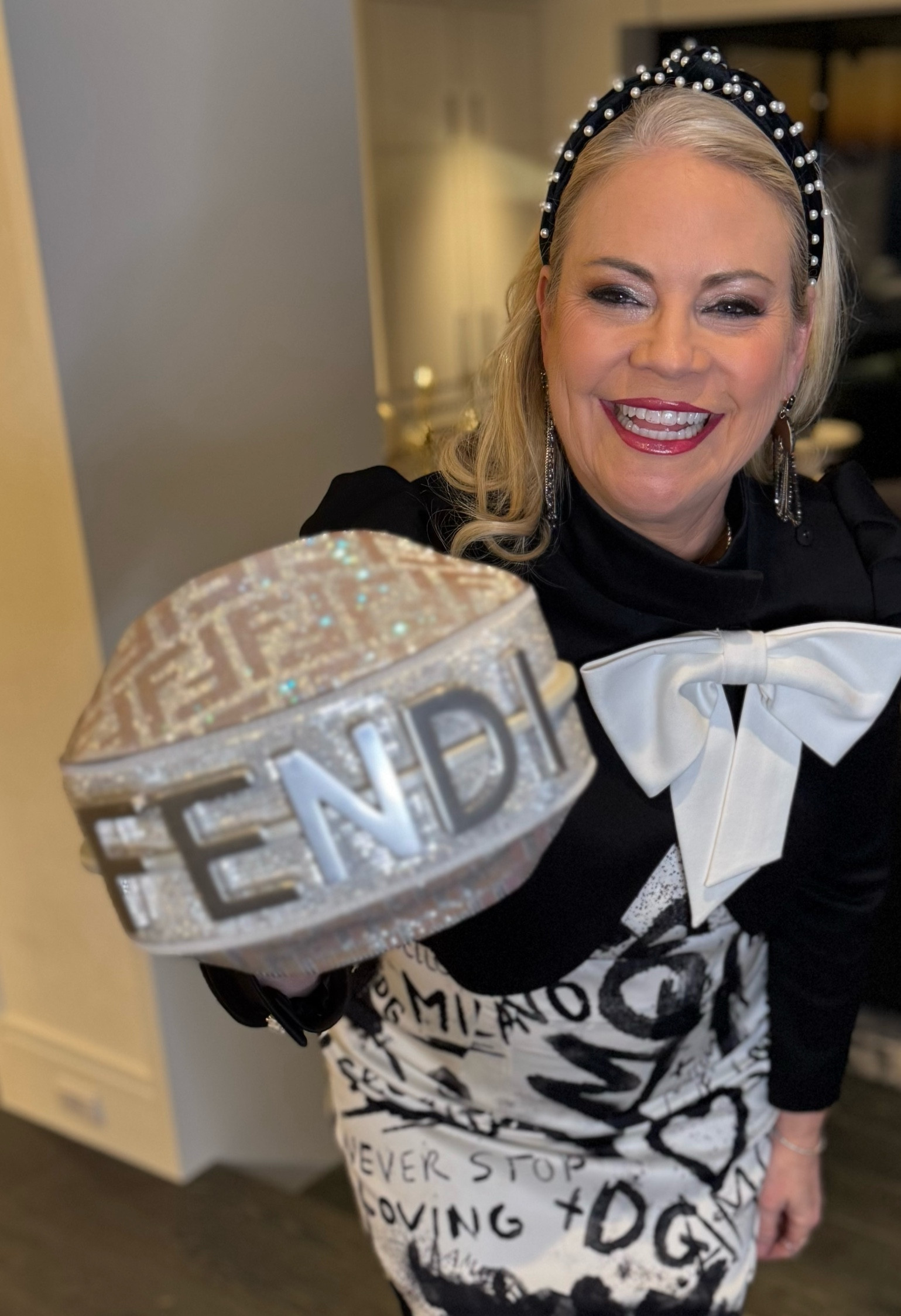 Fendigraphy mini bag.  So many compliments. Unfolds into a crossbody.   Fendi handbag.  Designer handbag.  Fendi sale. Fendi accessories.  

#LTKStyleTip #LTKWatchNow #LTKSaleAlert