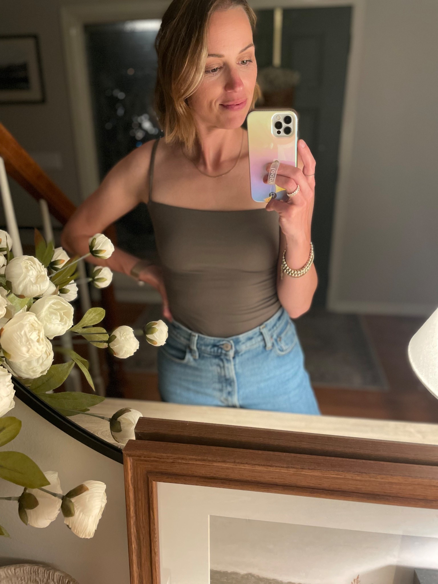 Grabbed this top so fast after @sarahstyledhome shared it! So comfy. Not a body suit, but cinched at waist and tuckable with high-waisted jeans! Wore it for a girls night 🫶🏻 definitely plan to grab in other colors!

#LTKFindsUnder50 #LTKStyleTip
