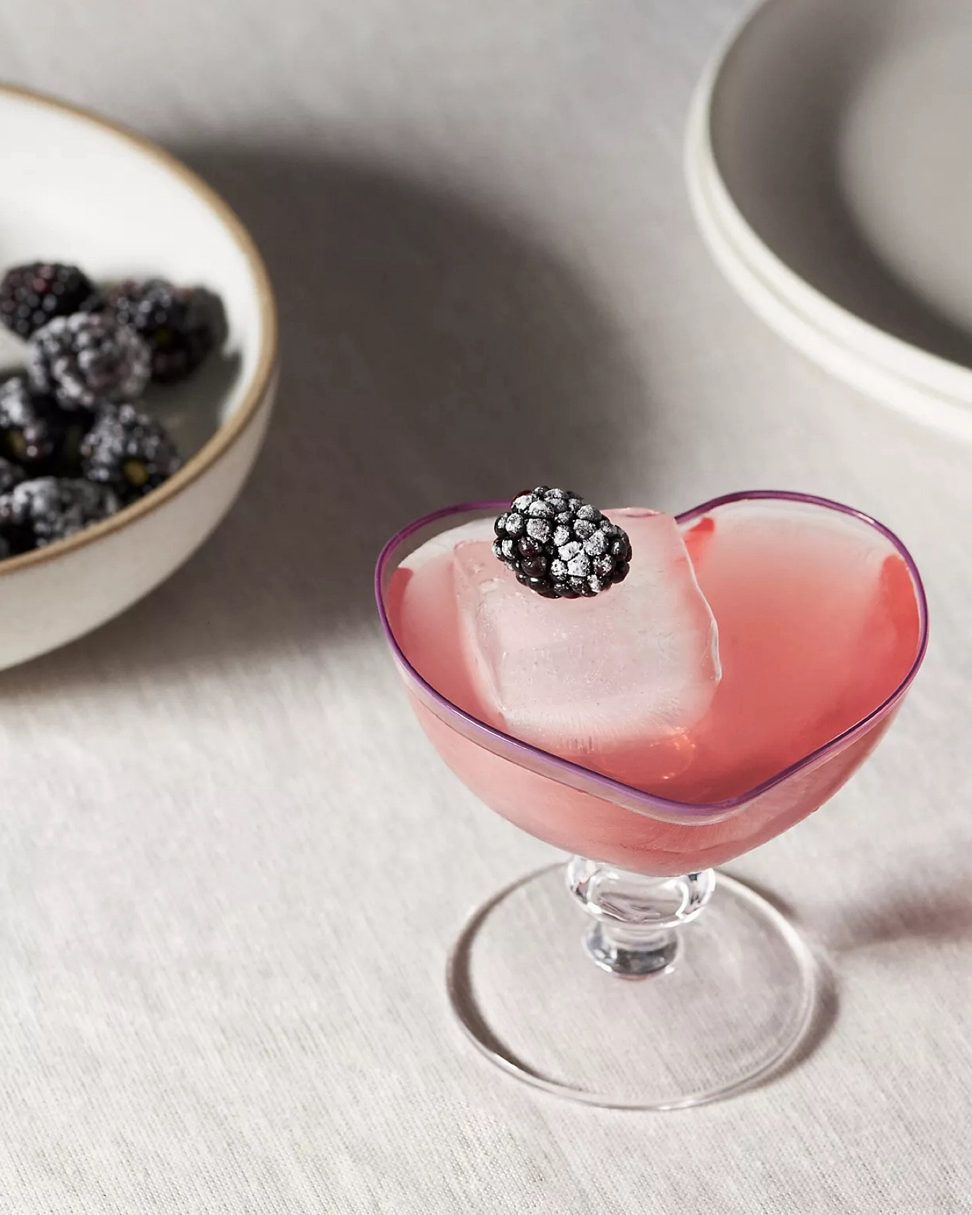 These Valeria Coupe Glasses feature a wide brim saucer design and heart shaped glass finish for a sophisticated and unique cocktail glass. They are also perfect for ice cream, mousse or other desserts. These would be a thoughtful wedding gift for newlyweds or a lovely surprise for Valentine’s Day. Available in pink and violet.

#LTKhome #LTKSeasonal #LTKGiftGuide