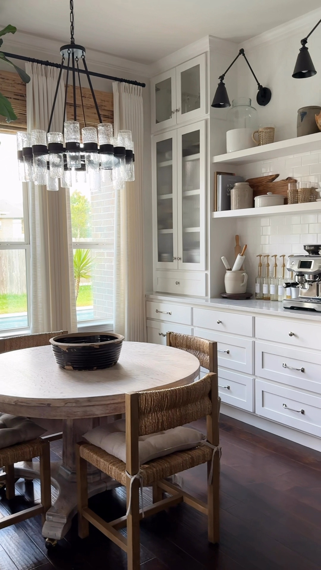 Kitchen dining nook with antique round table, woven dining chairs, linen drapes, and bamboo blinds

Use code CRAZYWONDERFUL for 20% off your drapes purchase



#LTKHome