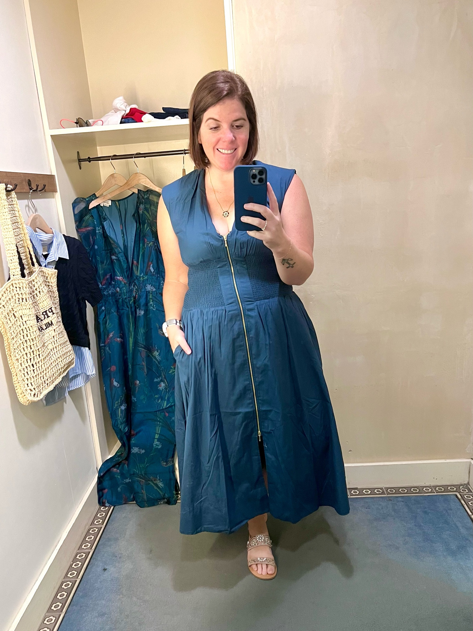 This dress is a showstopper! Love the material, love the color and definitely love the gold zipper accent on this dress!! This Anthropologie dress runs TTS, but if you are a bustier lady, then size up because the zipper will go down when you breathe! 

#LTKxAnthro #LTKstyletip #LTKsalealert