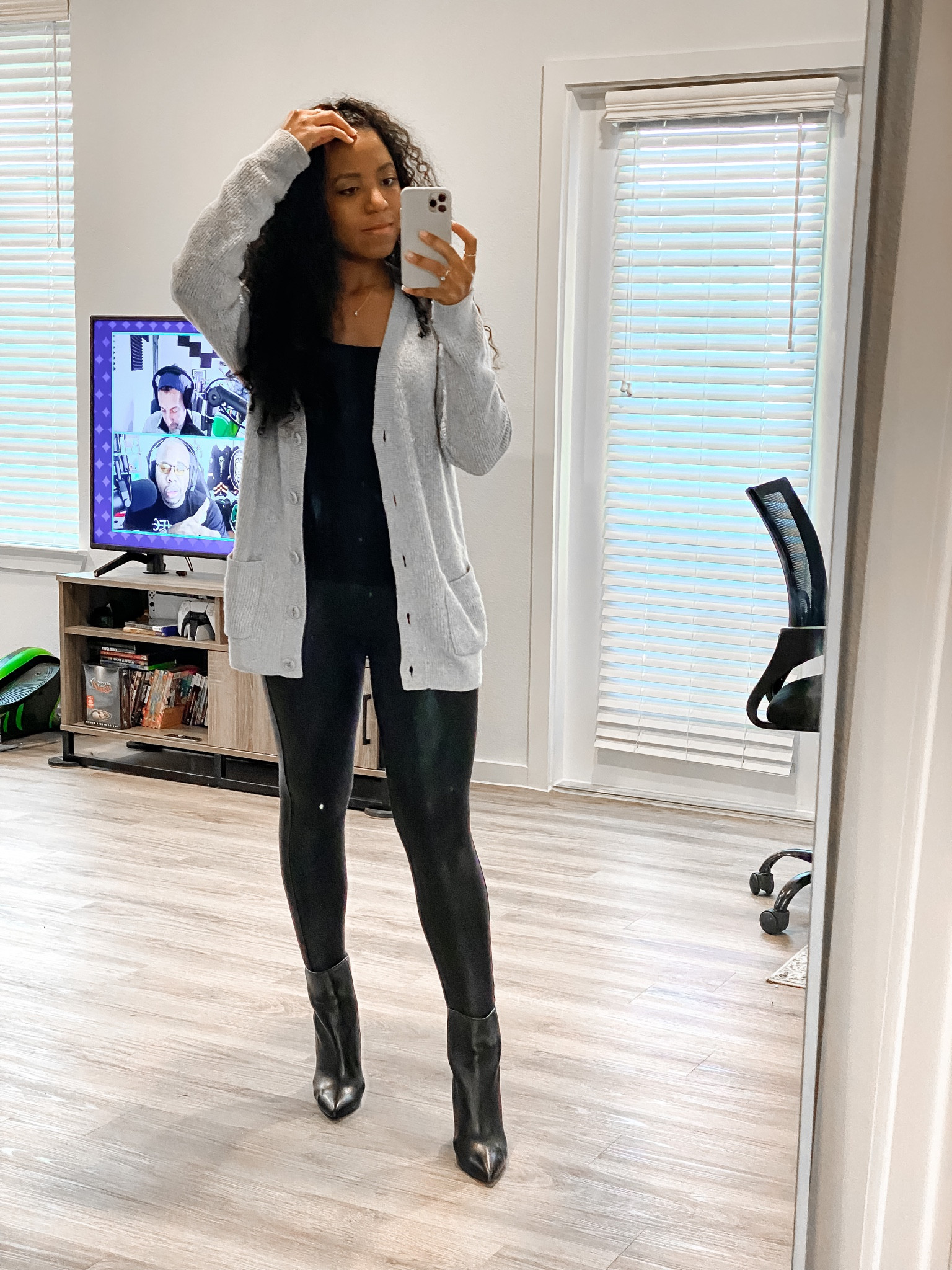 A cozy casual outfit that can double as an airport look for your next vacation. Swapping standard leggings for leather and wearing boots instead of flats keep the comfort but boost the style. Throw on an oversized cardigan like this cozy favorite for an extra layer   

#LTKFind #LTKunder100 #LTKstyletip