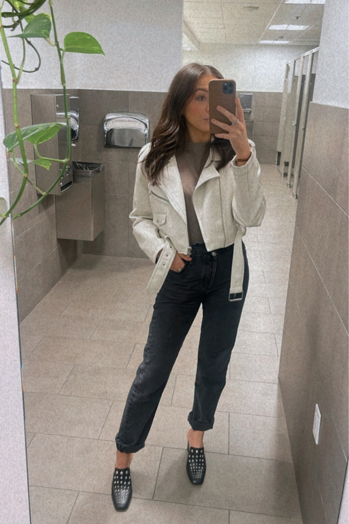 Beige cream leather jacket outfit 
Washed black criss cross asymmetrical jeans 
