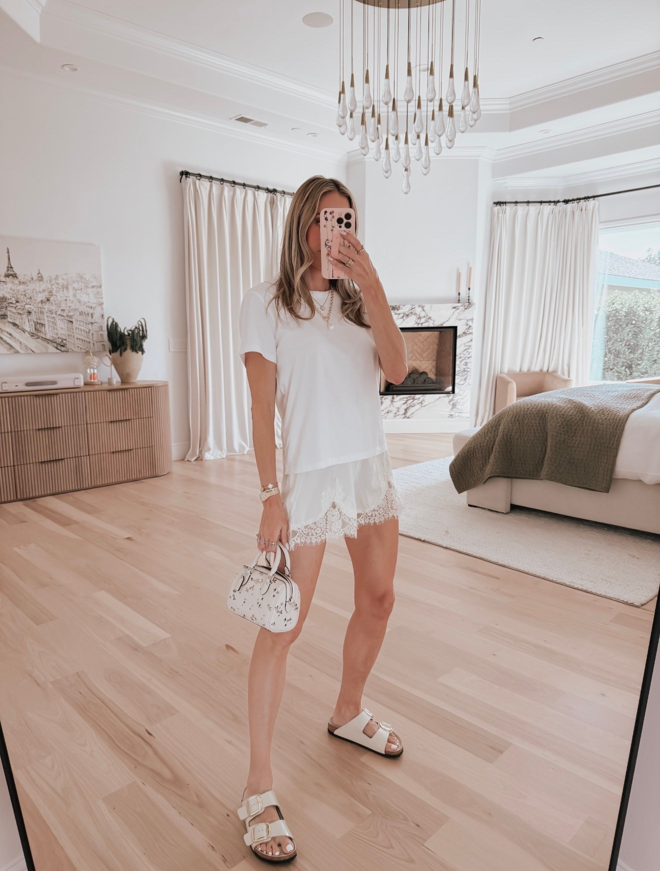 White tee outfit ideas that always work 🤍 The perfect white tee paired with lace silky shorts is that effortless combo you’ll keep reaching for. Add a necklace, sandals, shield sunglasses, and you’re out the door in minutes. Easy summer outfit, casual chic outfit idea, elevated basics, vacation outfit inspo, everyday style, neutral outfit idea, simple outfit formula.

#LTKdayinmylife #LTKmomlife #LTKOver40