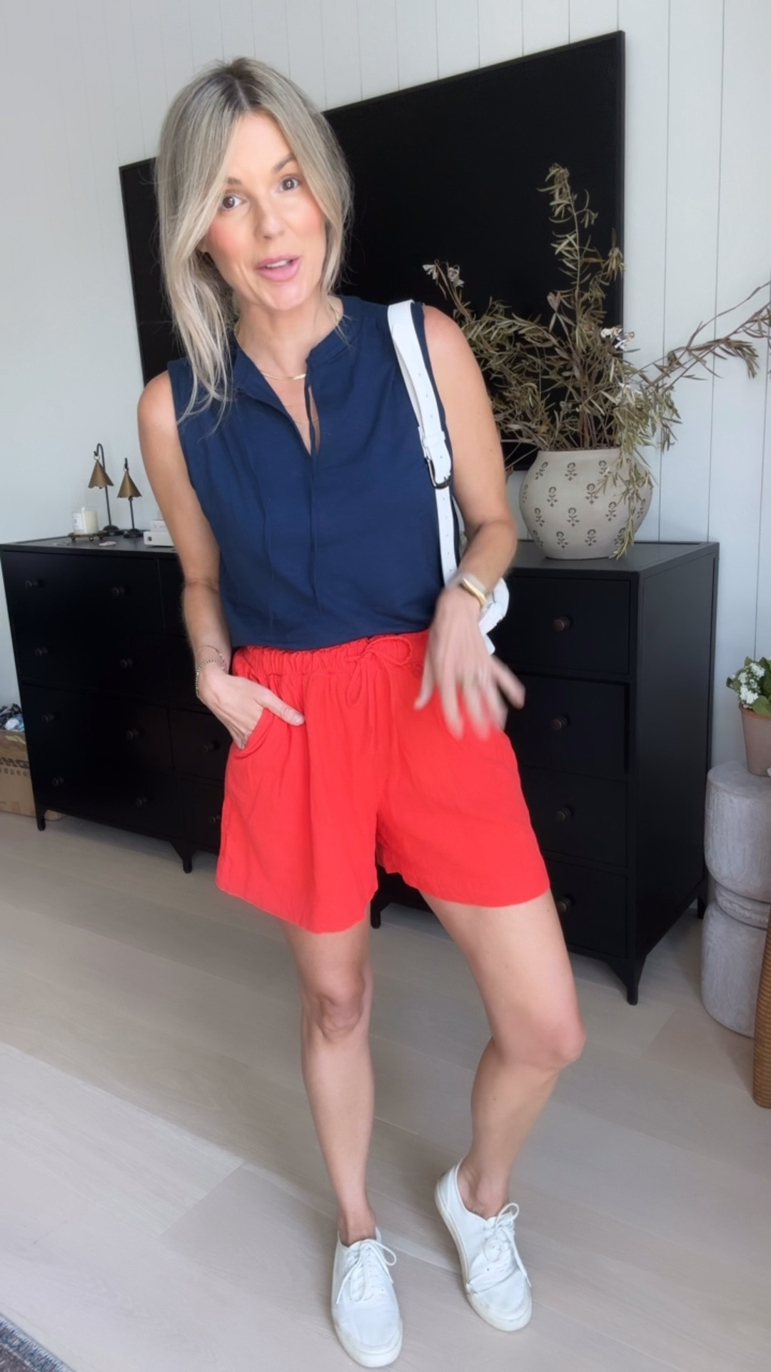 Technically, these shorts are kind of an orange color but they look red with the top and they come in red. They’re available in sizes extra small to three XL. It are only $17. And the top is only $12 and looks so great tucked in or not tucked in. I love these pieces and you can mix and match them with different things all summer because they’re just solid pieces. I’m wearing a size small, which is my normal size in both

#LTKSeasonal #LTKTravel #LTKSaleAlert