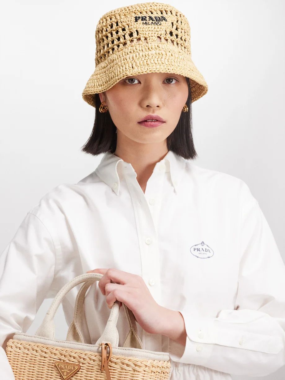 Logo-embroidered faux-raffia bucket hat | Prada | Matches (UK)