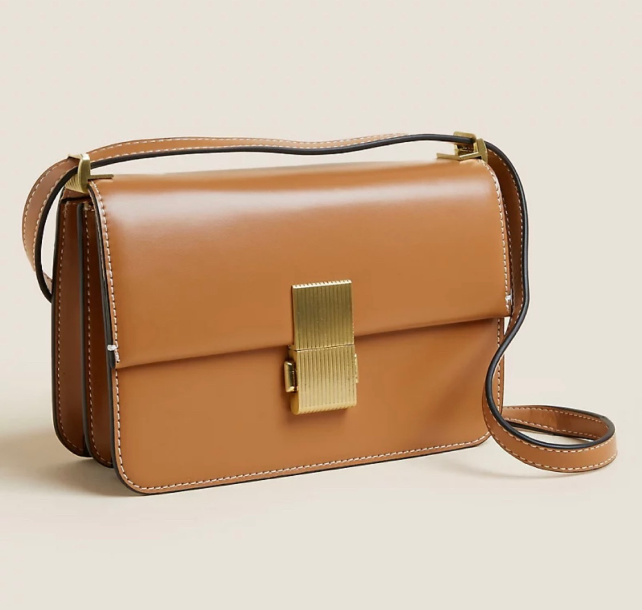The perfect capsule wardrobe bag is back in stock on M&S! 

It’s so similar to the design of my all time favourite Celine Classic box bag but for £35 instead! 😍

#LTKFind #LTKitbag #LTKstyletip
