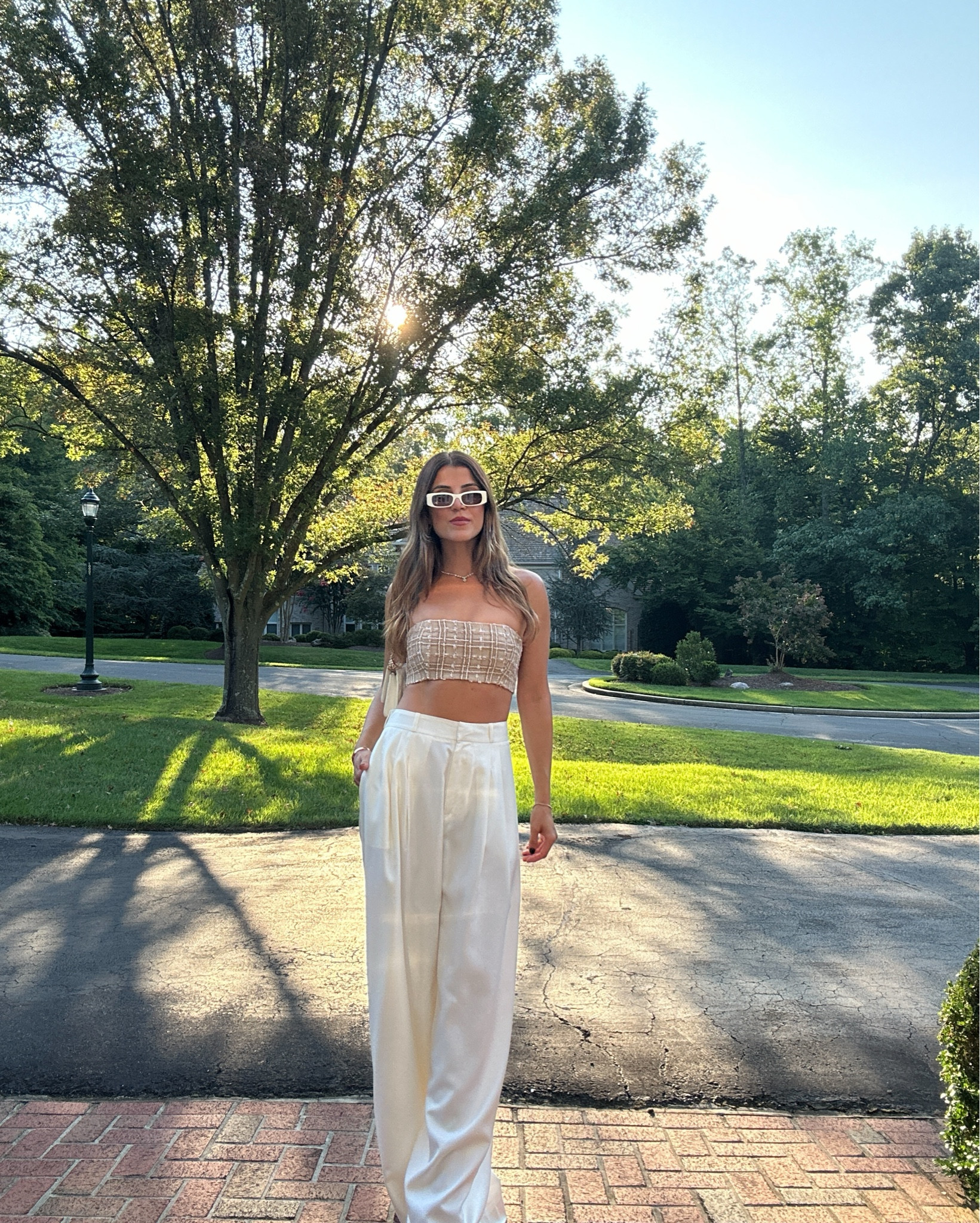 Getting dressed during this brief period as the seasons change is easier than you think!

The end of August and early September can be tricky. Temperatures can still hit the 80s/90s, but with back-to-school vibes and fall fashion on the horizon, it feels like the perfect time to start transitioning your wardrobe.

Begin by retiring your bright whites and summer colors, and shift your palette to warmer neutrals and deeper shades. We’ll soon be fully embracing rich autumnal hues of beige, green, brown, and rust.

Here are 3 style tips to navigate this transitional period:

1.	Incorporate lightweight fall textures into your outfits. This tweed bralette by @kimberlytaylormiami is a great example—it gives off a fall vibe without being too heavy for summer.
2.	Swap your bright whites for creamier tones. Off-white and ivory are more seasonally appropriate for the rest of the year. I’ve had these @zimmermann pants for years, and they’re a wardrobe staple. Every time I wear them, I get tons of compliments.
3.	Add warmth to your beauty routine. Yesterday, I made the switch from my usual light neutral summer polish to “Wicked” by Essie—it’s one of my fall go-to’s.

I hope you guys find these tips helpful.

Enjoy these last few weeks of summer before fall takes over. 

#fall2024
#Fallfashion 
#livefullystyled

#LTKSeasonal #LTKStyleTip #LTKBacktoSchool