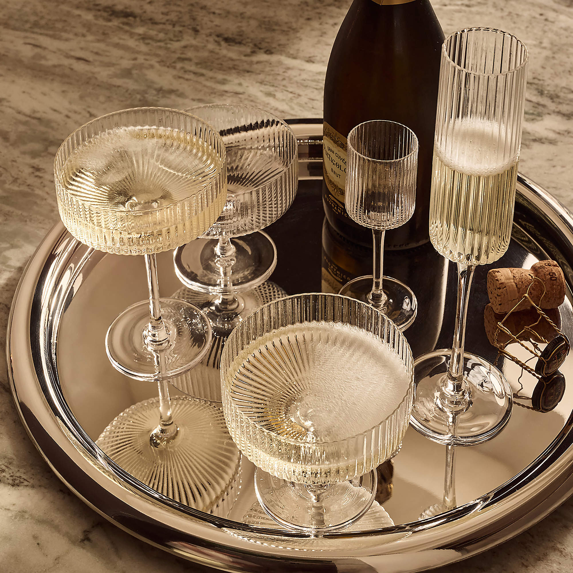 Piero Round Polished Stainless Steel Serving Tray by Gianfranco Frattini + Reviews | CB2 | CB2