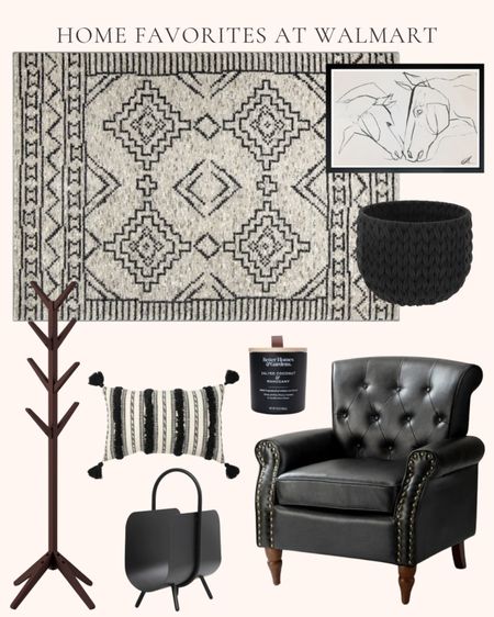 Home decor and furniture favorites at Walmart. Home furnishings. Living room decor. Weaved black storage basket. Mid century accent wingback chair with wooden legs. Freestanding coat rack stand. Horse framed wall art. Black and grey area rug. 20” black metal magazine holder. Salted coconut and mahogany jar candle. Black and cream tufted throw pillow. 22” urn style black table lamp  

#LTKhome