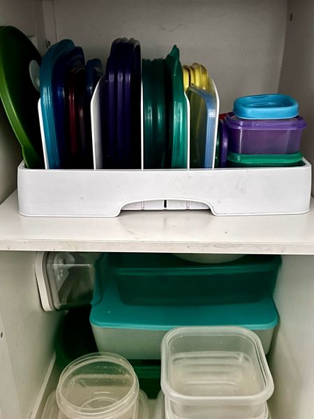 Kitchen storage for plastic lids. Helps stack the containers and keep the lids organized by size and shape. 
Kitchen
Kitchen storage
Organizer 
Kitchen organizer 

#LTKfindsunder50 #LTKhome #LTKfindsunder100