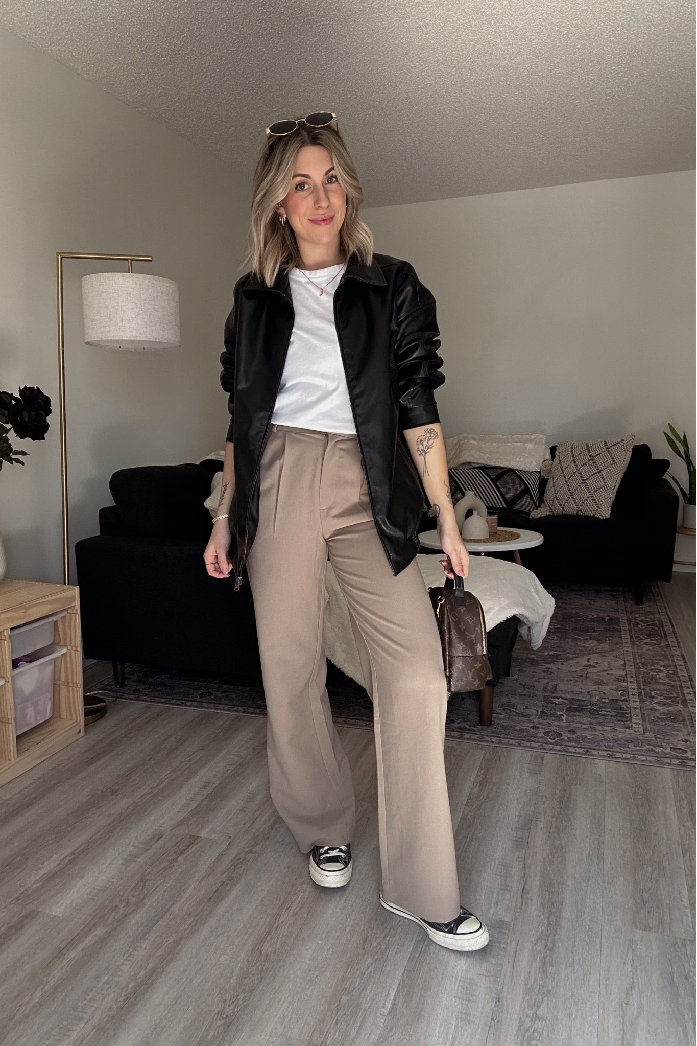 Early spring OOTD 
Uniqlo white tee, size medium 
Abercrombie Sloane pants, size 27 tall 
Converse 
Amazon bomber jacket (wearing a medium) 
Amazon sunnies

#LTKfindsunder100 #LTKworkwear