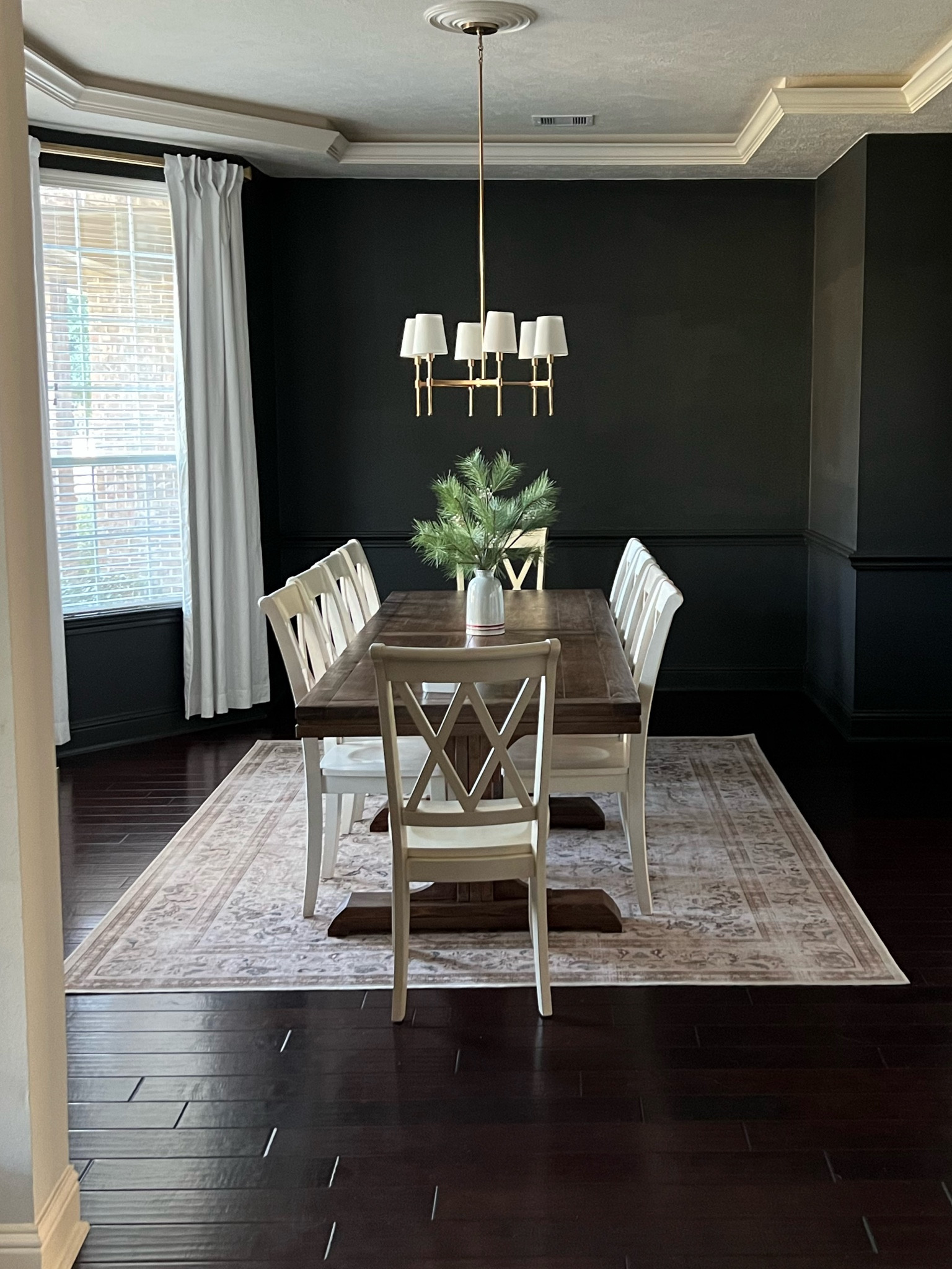 Moody black dining room, Moody dining room, iron ore black walls, dining room inspo, dining room design, dining room decor, home decor, interior design, dining room rug, washable rugs, vintage rug, studio mcgee, McGee and co, gold chandelier, white linen curtains, dining room chairs, holiday decor, Christmas decor

#LTKstyletip #LTKHoliday #LTKhome