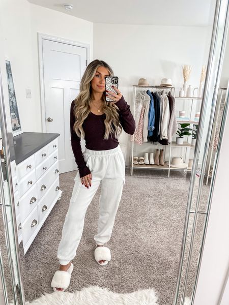 Target ribbed long sleeve top: xs
Target cargo sweatpants: xs 
Slippers are true to size! 
Code KAIT20 to save on electric picks 

#LTKstyletip #LTKfindsunder50 #LTKSeasonal