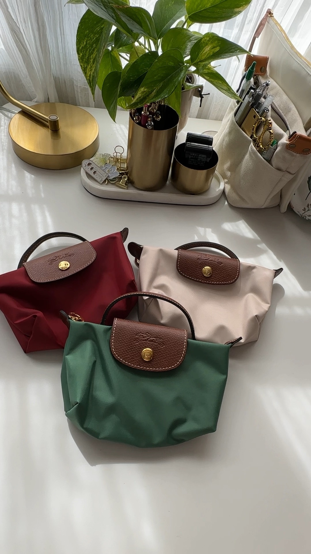 Longchamp Pouch is cute for mini bag ! 
(I’ll add the exact red once it restocks, I linked the new red pouch)

#LTKitbag #LTKVideo #LTKfindsunder100