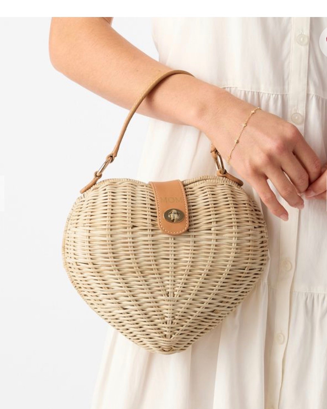WICKER AND LEATHER HEART CROSSBODY

The perfect petite companion for a day-to-night look, from picnics and brunch to special occasions. This handwoven, heart-shaped natural fiber bag with sleek leather accents can be converted from a crossbody to a handbag in an instant with the removable strap. Add a monogram to make it yours

#LTKSeasonal #LTKWedding #LTKTravel