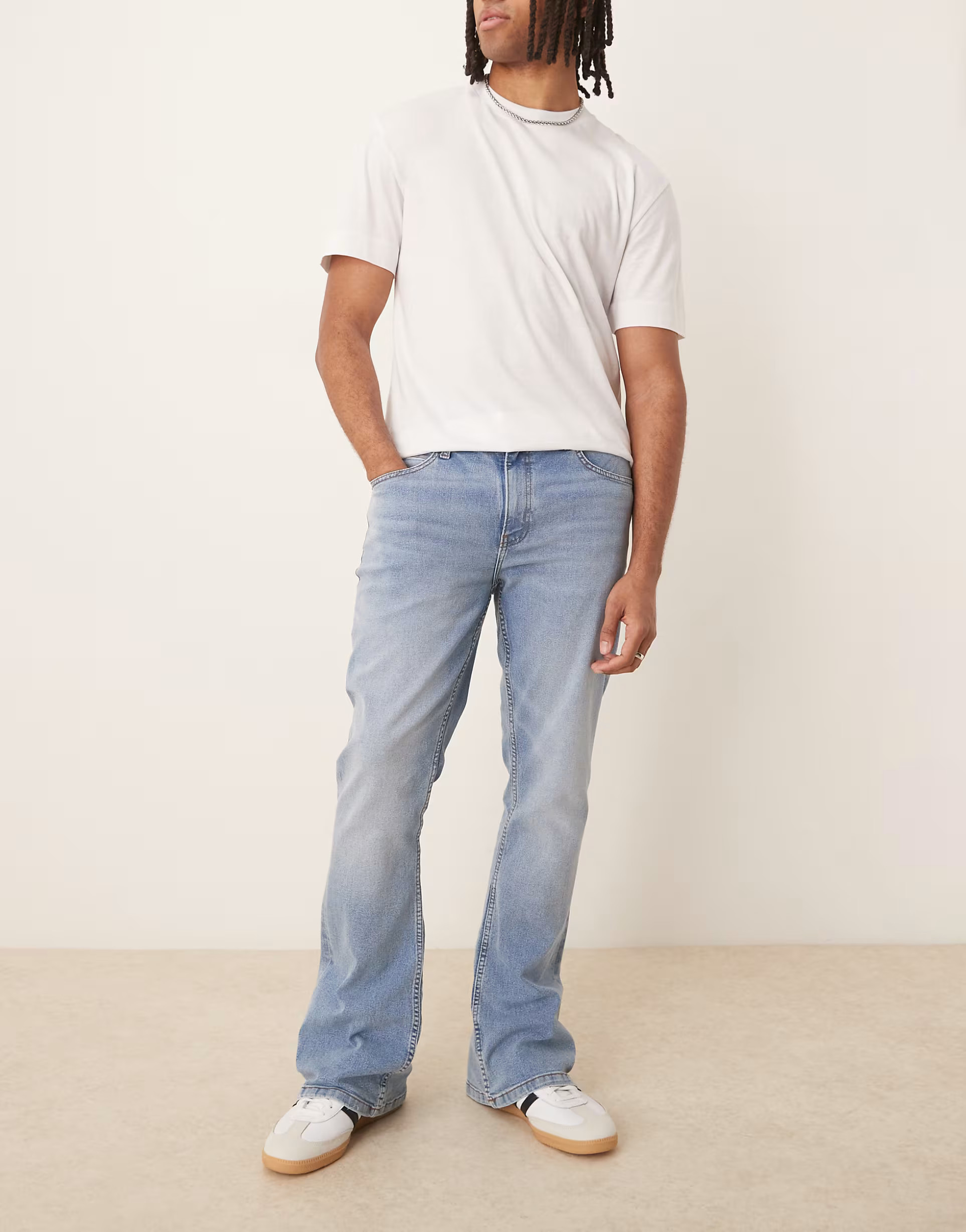 ASOS DESIGN stretch flare jeans in light wash blue | ASOS (Global)