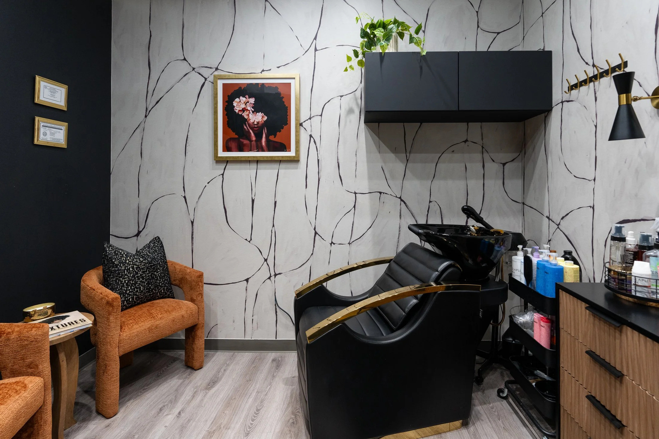 #ThrowbackThursday to this salon transformation for Stylez by Roz. ✨ Bold contrast, rich textures, and statement wallpaper came together to create a space that feels elevated, welcoming, and unforgettable.

Because great design should make an impression the moment you walk in. 💛

#CommercialInteriorDesign #SalonDesign #SalonDecor #WallpaperDesign #BlackOwnedBusiness #SoulfulMaximalism #InteriorStyling #DesignInspiration 

 #LTKHome