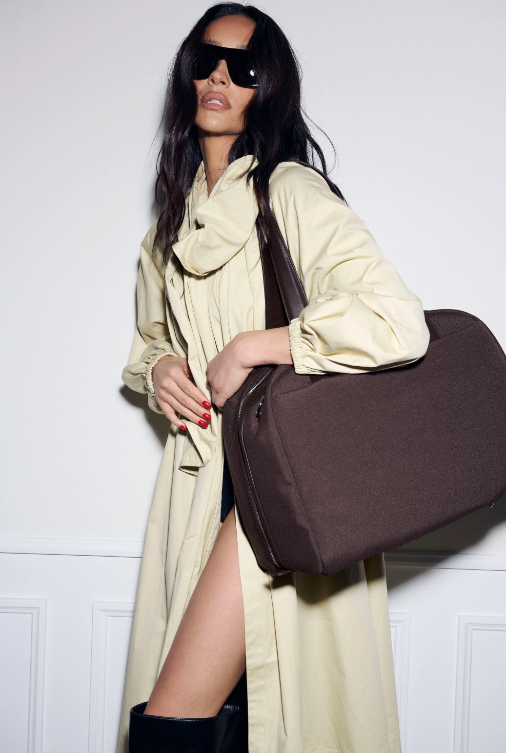The ultimate travel bag 🤎 The BÉIS The Duffle in Espresso is designed to make travel effortless and organized. I love the wide semi-clamshell opening for easy access, plus all the smart compartments — laptop sleeve, water bottle pocket, front zip pocket, and even a key leash so everything has its place. The structured half-moon shape, leather trim, and padded straps make it as chic as it is functional. Perfect for flights, weekends away, or everyday carry-on use ✨ 

 #LTKgrwm #LTKootd #LTKTravel