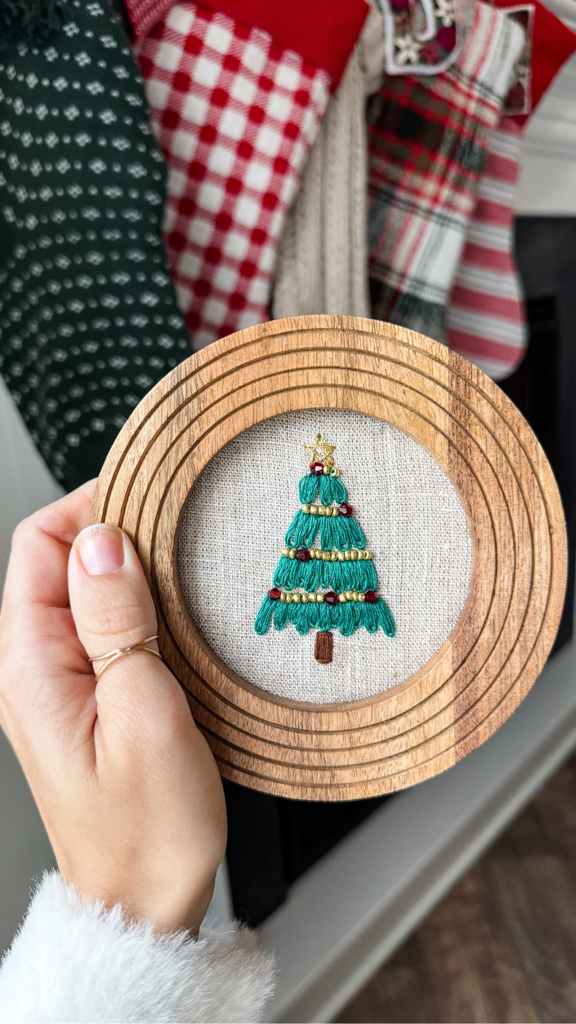 Embroidered Christmas tree ornament in a round picture frame 

#LTKSeasonal #LTKFindsUnder50 #LTKHome