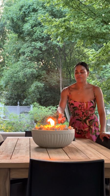 Tabletop fire bowl hack. Tiki tabletop torch, at home cement bowl.  Add rocks and you’re done!  