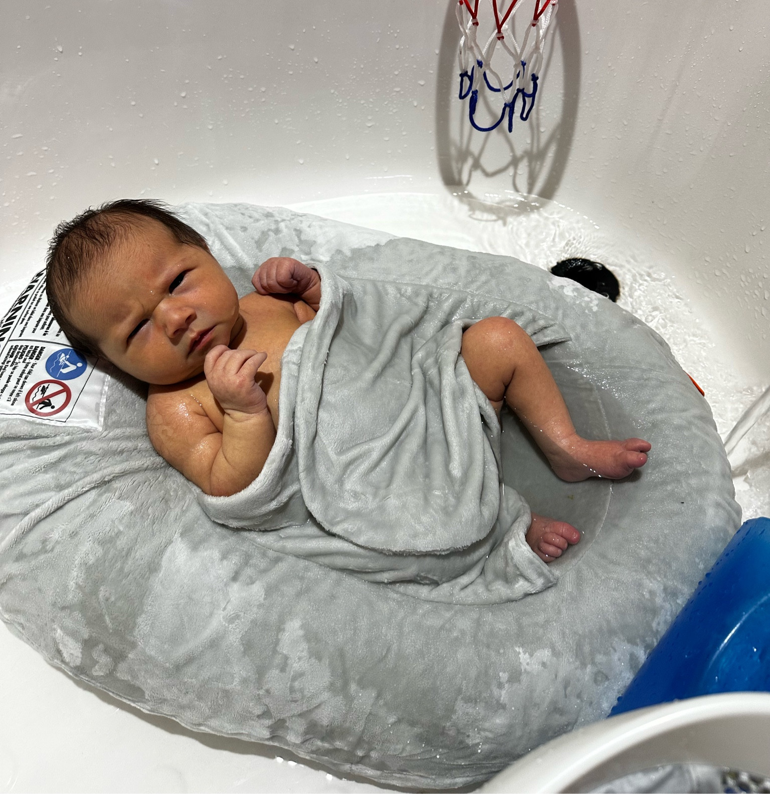 our fave newborn bath— keeps them warm and cozy (and sleepy!) with a built in washable cover/flaps!
