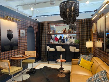 Leather sofa, plaid wallpaper, and mirror wall bar ideas  

#LTKmens #LTKhome #LTKstyletip