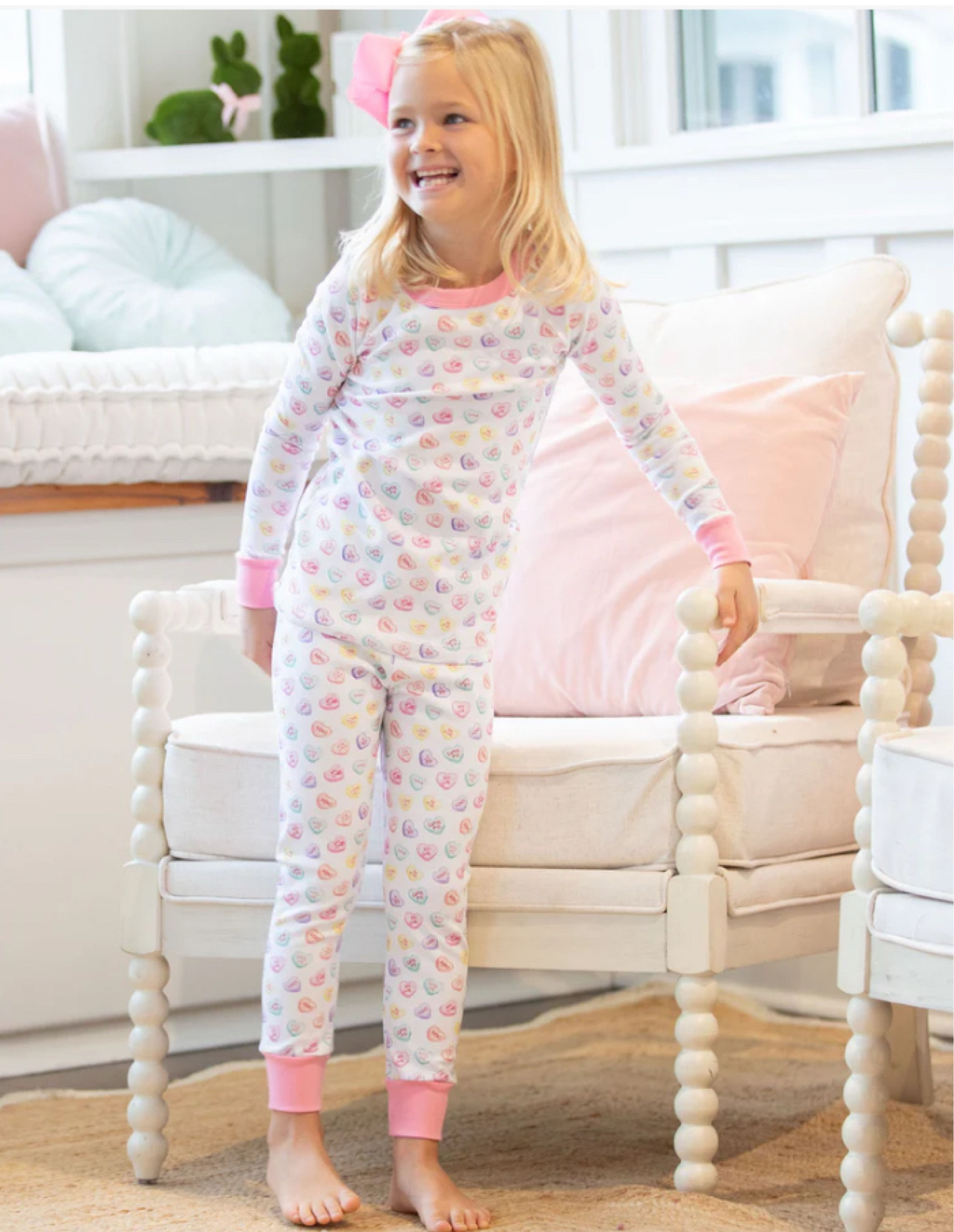 Pink depicts joy, kindness, tenderness, and honesty! And honestly this Girls Pima Loungewear-Candy Hearts by Pippa is one of the happiest pajama sets around!  

These pjs feature a vintage candy heart print, on the softest white pima cotton with pink  trim around the neckline and pink cuffs. These Valentine jammies includes matching pants with pink cuffs. 

#LTKFamily #LTKKids #LTKFindsUnder50