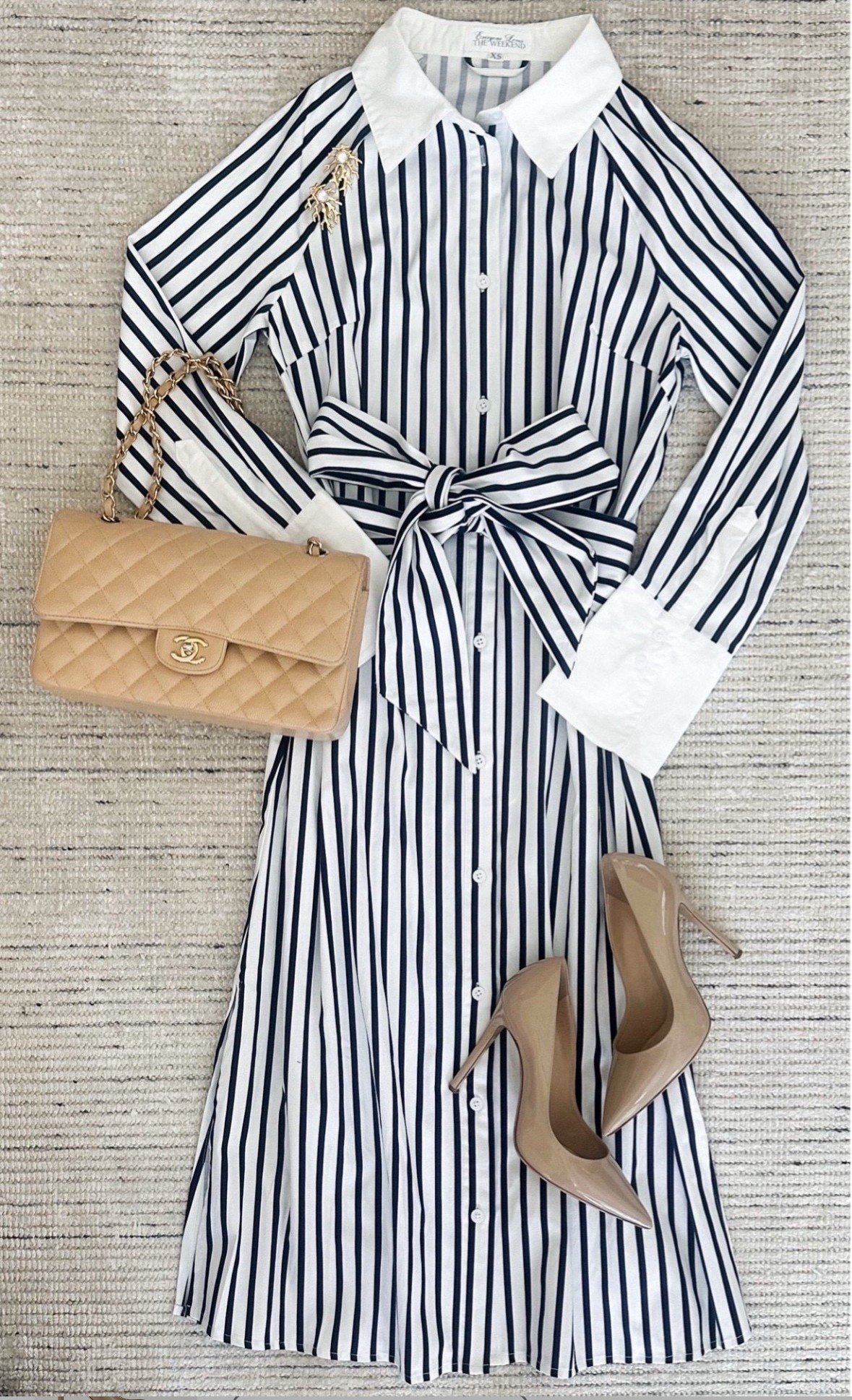 Striped midi dress that has button closure down the front, shirt collar, tie waist and super flattering on. Paired it with pumps for a chic look. Perfect for workwear or dinners. Can be dressed more casual with sneakers

#LTKSeasonal #LTKStyleTip