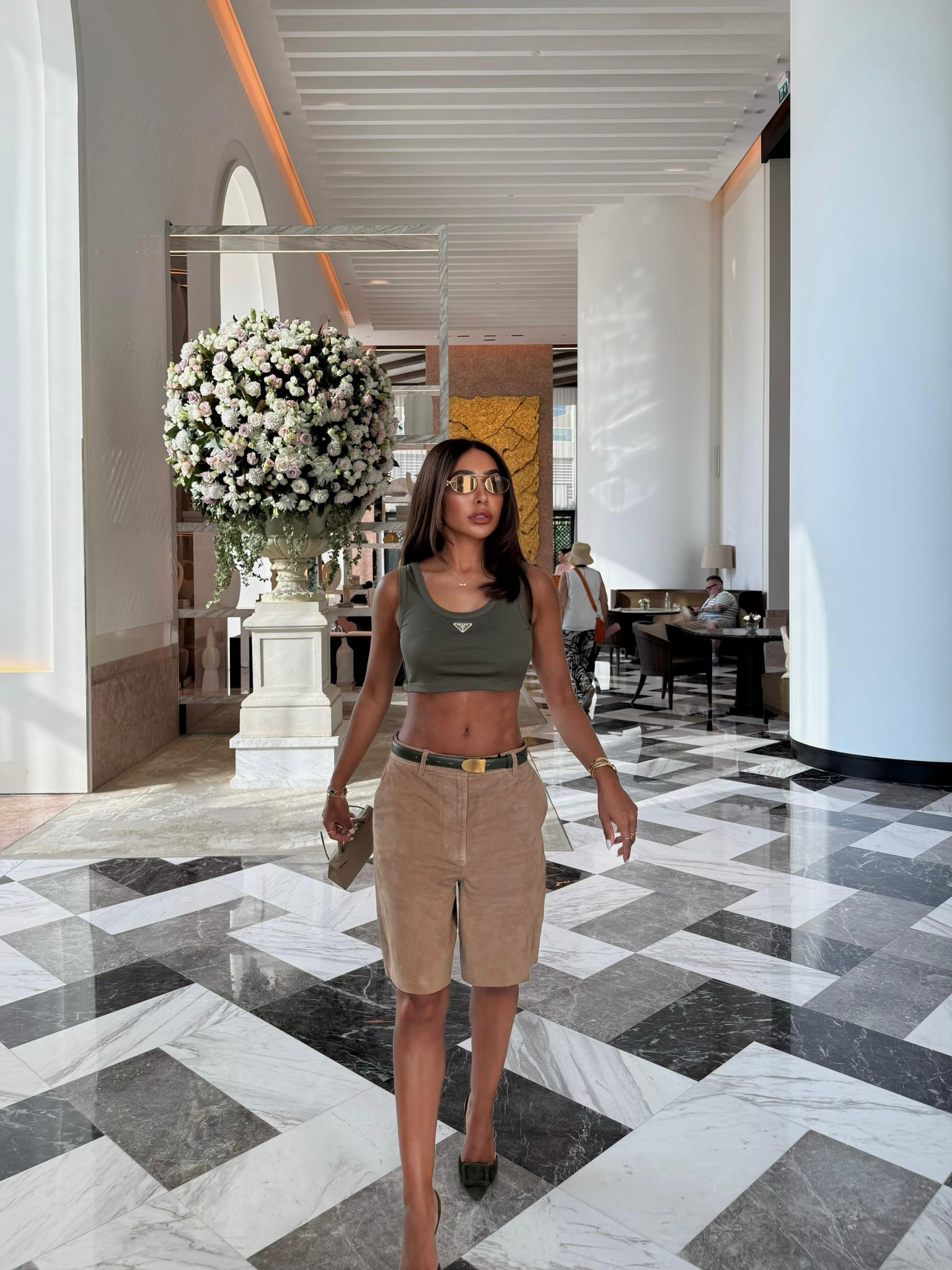 Casual outfit / coffee date / vacation / summer / spring / errands / Dubai / Bermuda shorts / suede shorts / prada  cropped tank top / H&M shorts / miu miu oval sunglasses/ Manolo heels / holiday outfit / euro summer 

#LTKsummer #LTKuk #LTKspring