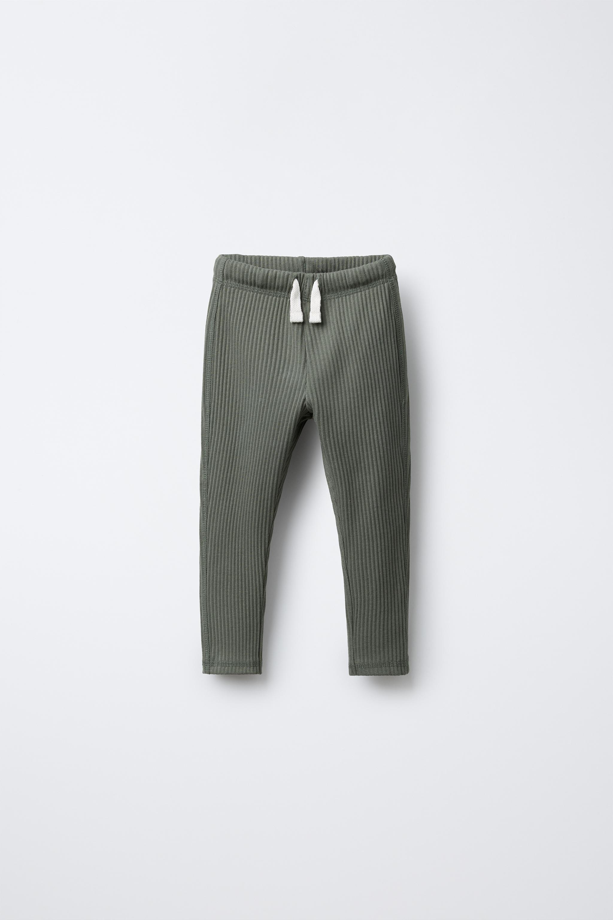 Ribbed leggings with elastic waistband and adjustable front drawstrings. Label appliqué on back. | Zara Canada