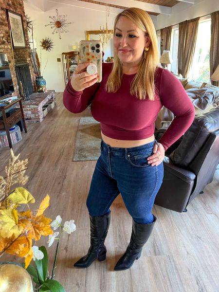 Holiday Cheer! Perfect outfit to pick out a Christmas tree! 
Wearing size L long sleeve
Size 15 jeans 
Size up 1/2 in boots (Great for my curvy calf gals!) 

#LTKHoliday #LTKcurves #LTKshoecrush